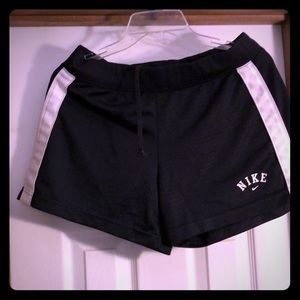 Navy blue shorts with white stripes